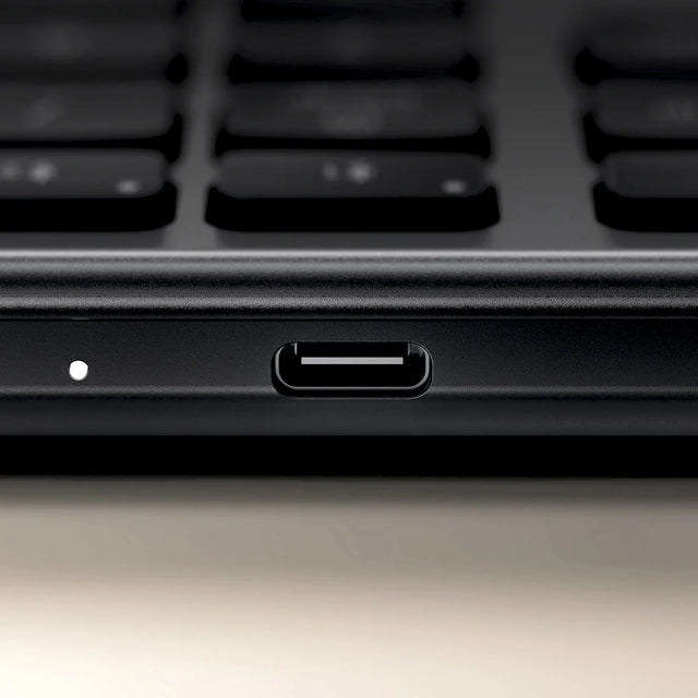 A close up the Slim EX3 Wireless Keyboard's USB-C port for the rechargeable battery.