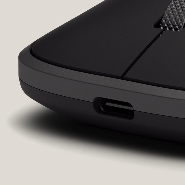 A closeup of the Slim Ex Wireless Mouse USB-C charging port.