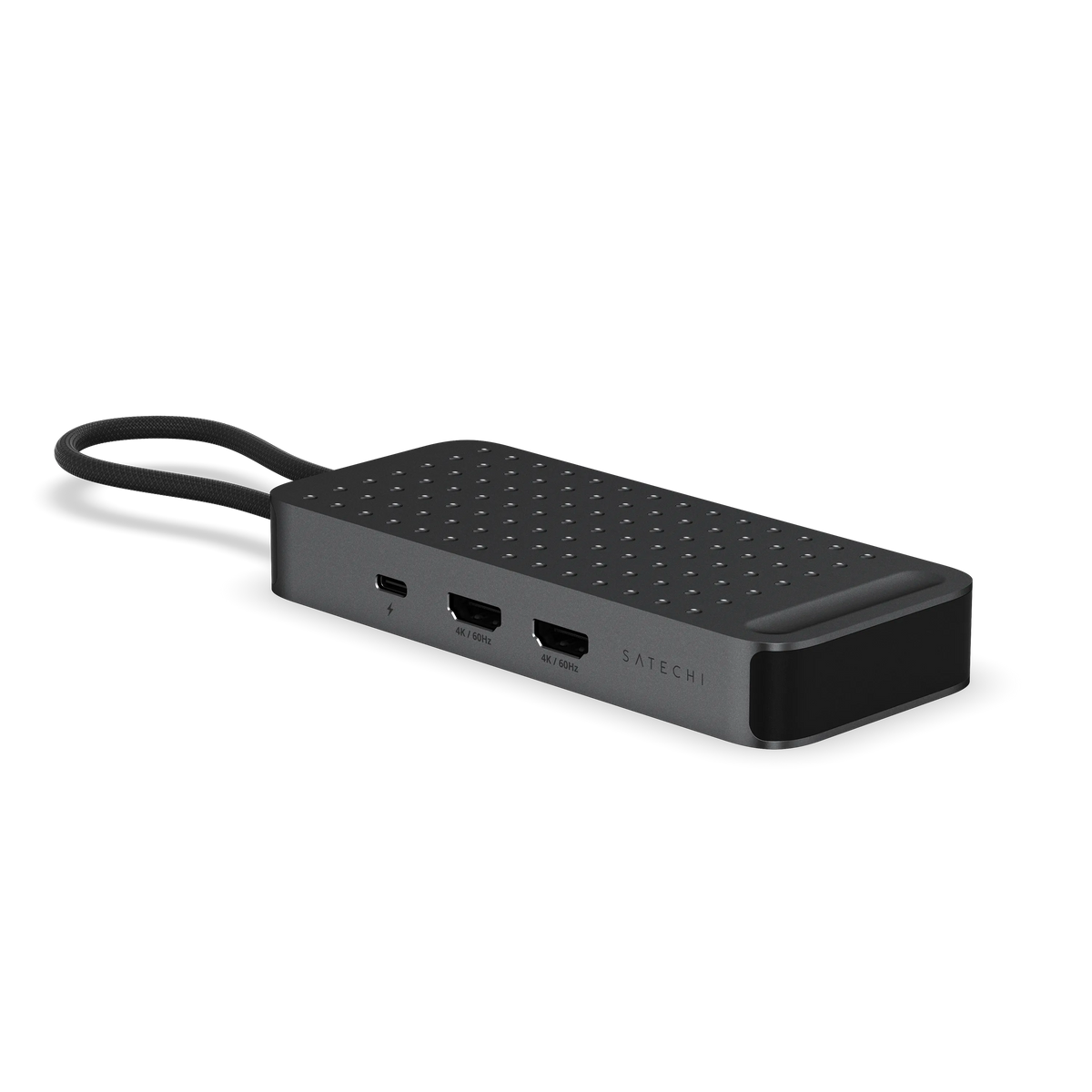 Space Black aluminum USB4 hub with its host cable looped into the built-in cable slot, showing the USB-C and two HDMI ports.