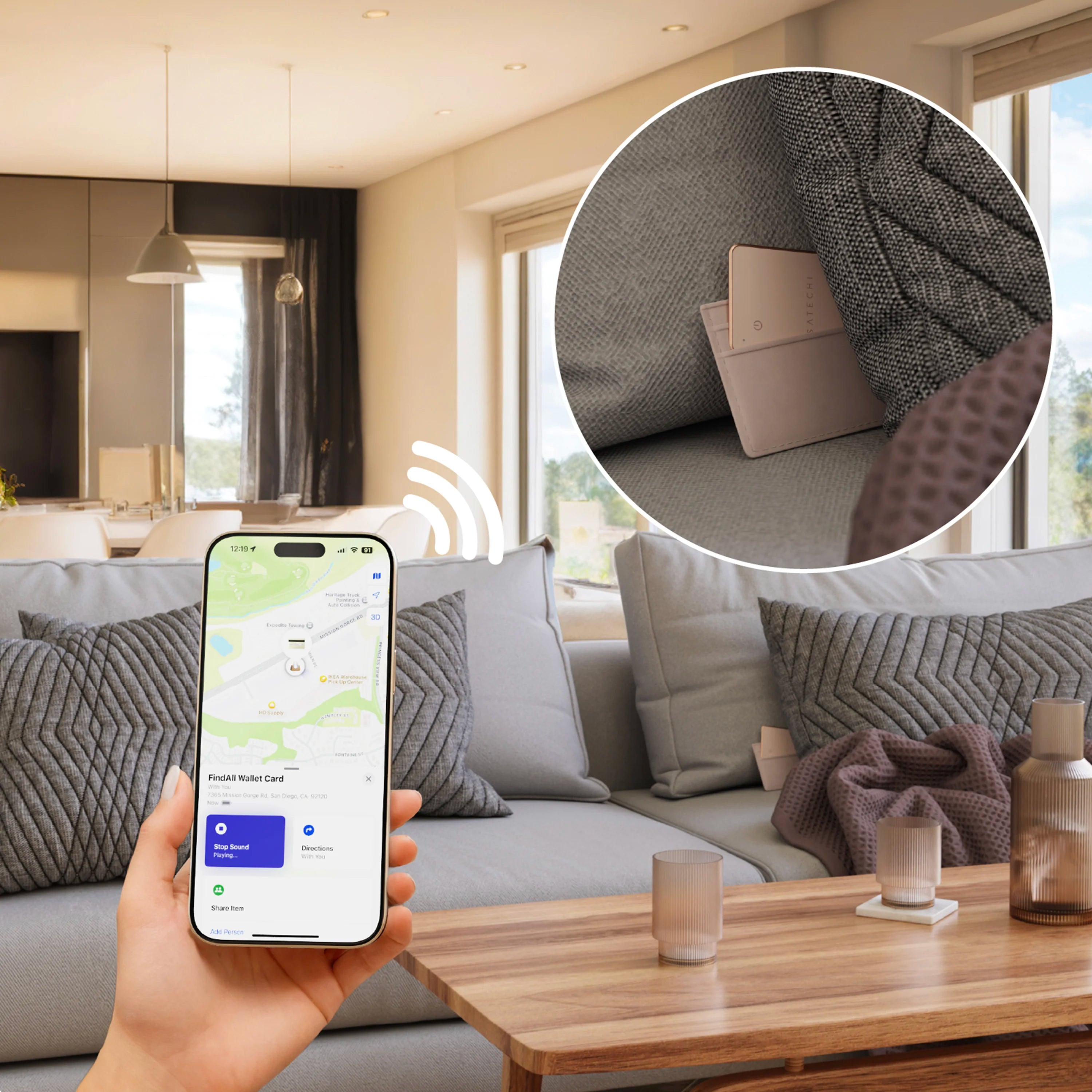 Person holding an iPhone with FindMy app on it, tracking a desert rose FindAll™ Card
hiding in the sofa in a living room.