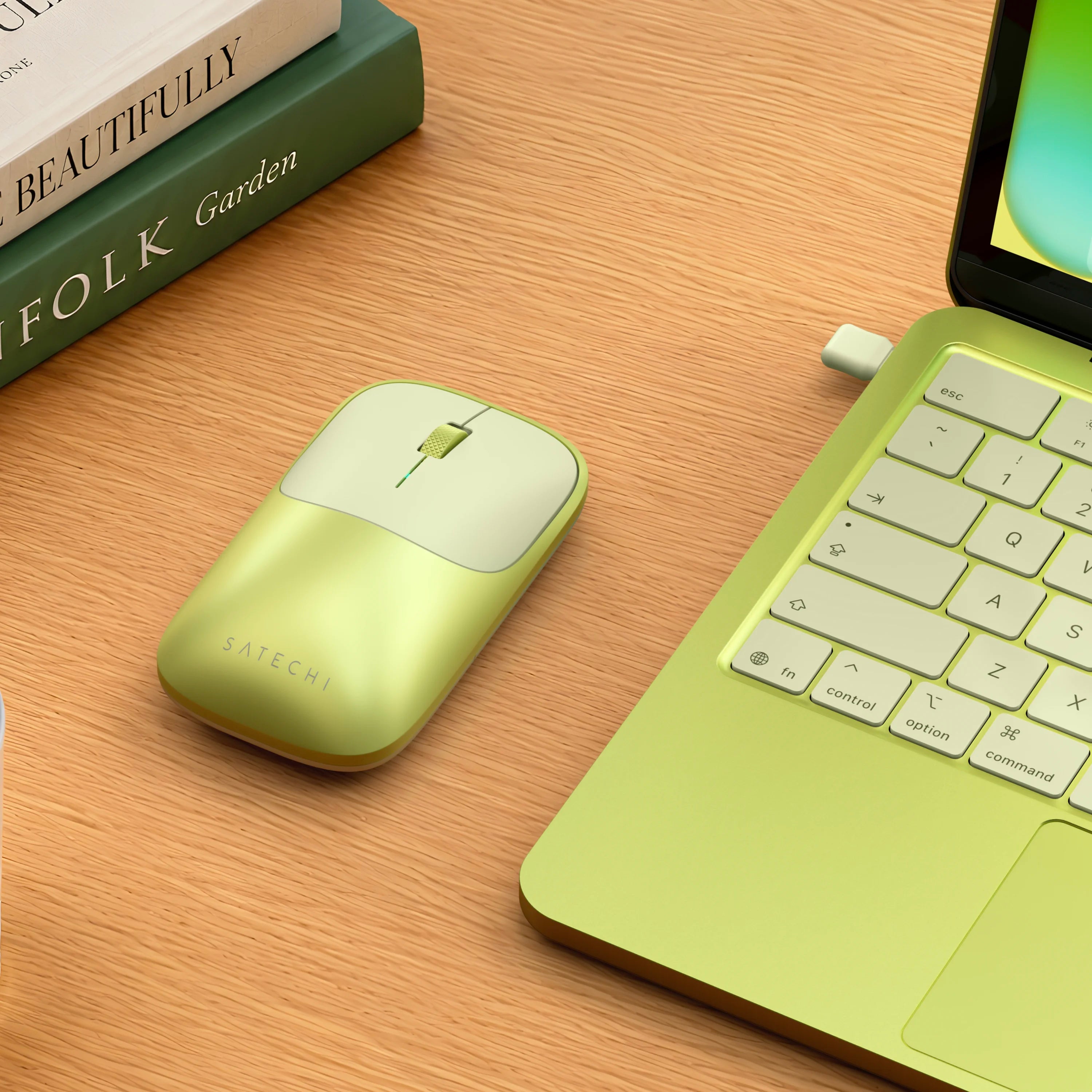Satechi Citrus Slim EX Wireless Mouse on desk next to citrus MacBook Neo.
