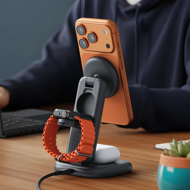 Satechi 3‑in‑1 foldable wireless charging stand on a nightstand, charging an iPhone, Apple Watch, and AirPods.