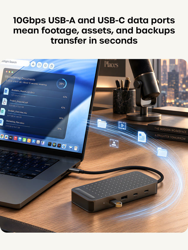 10Gbps USB-A and USB-C data ports mean footage, assets, and backups transfer in seconds. Satechi ExtendView USB4 hub connected to a laptop on a wood desk, with a USB flash drive in one of its USB-A ports. Glowing file, video and photo icons stream from the adapter to the laptop screen, which shows a Transferring Documents window reading 3.25 GB of 8.47 GB, About 10 seconds remaining, 38%, for Business_Report_Q2.docx, Project_Proposal.pdf, Budget_Overview.xlsx and Marketing_Plan.docx. 